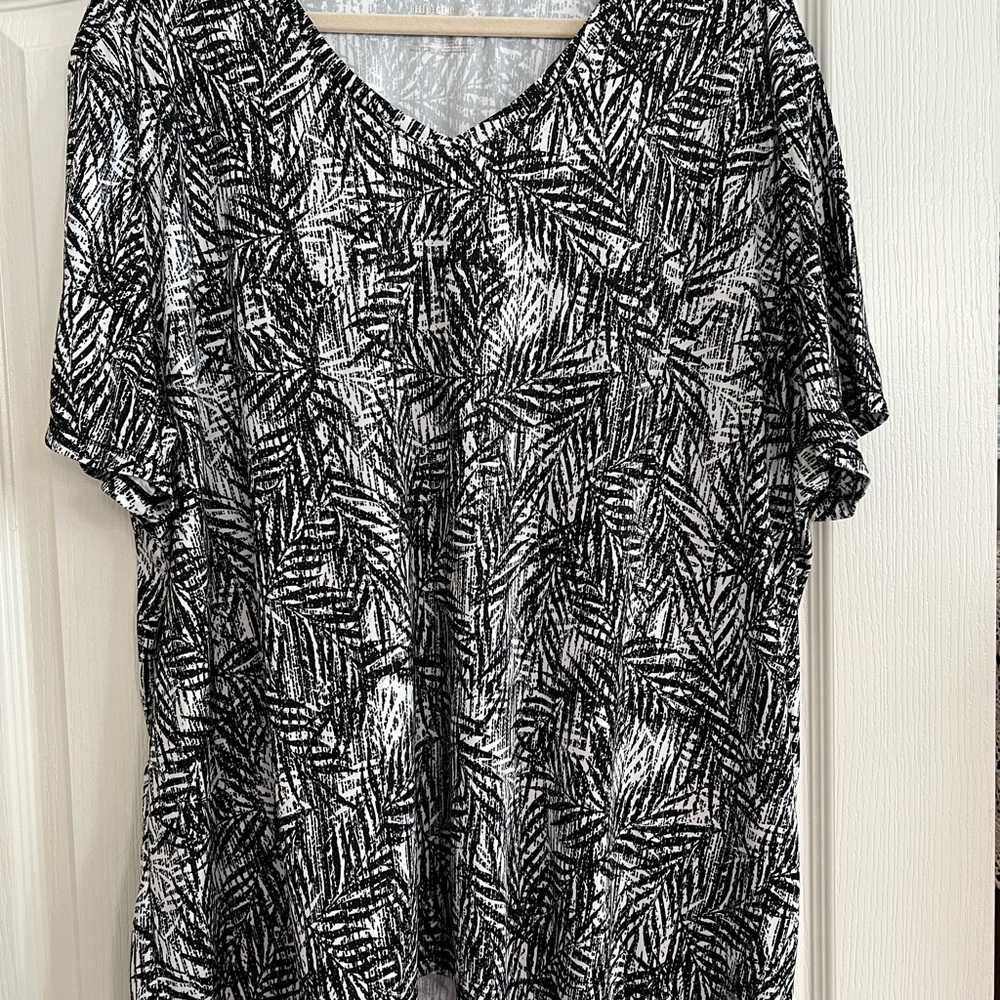 Reel Legends Black and White Activewear Tee.